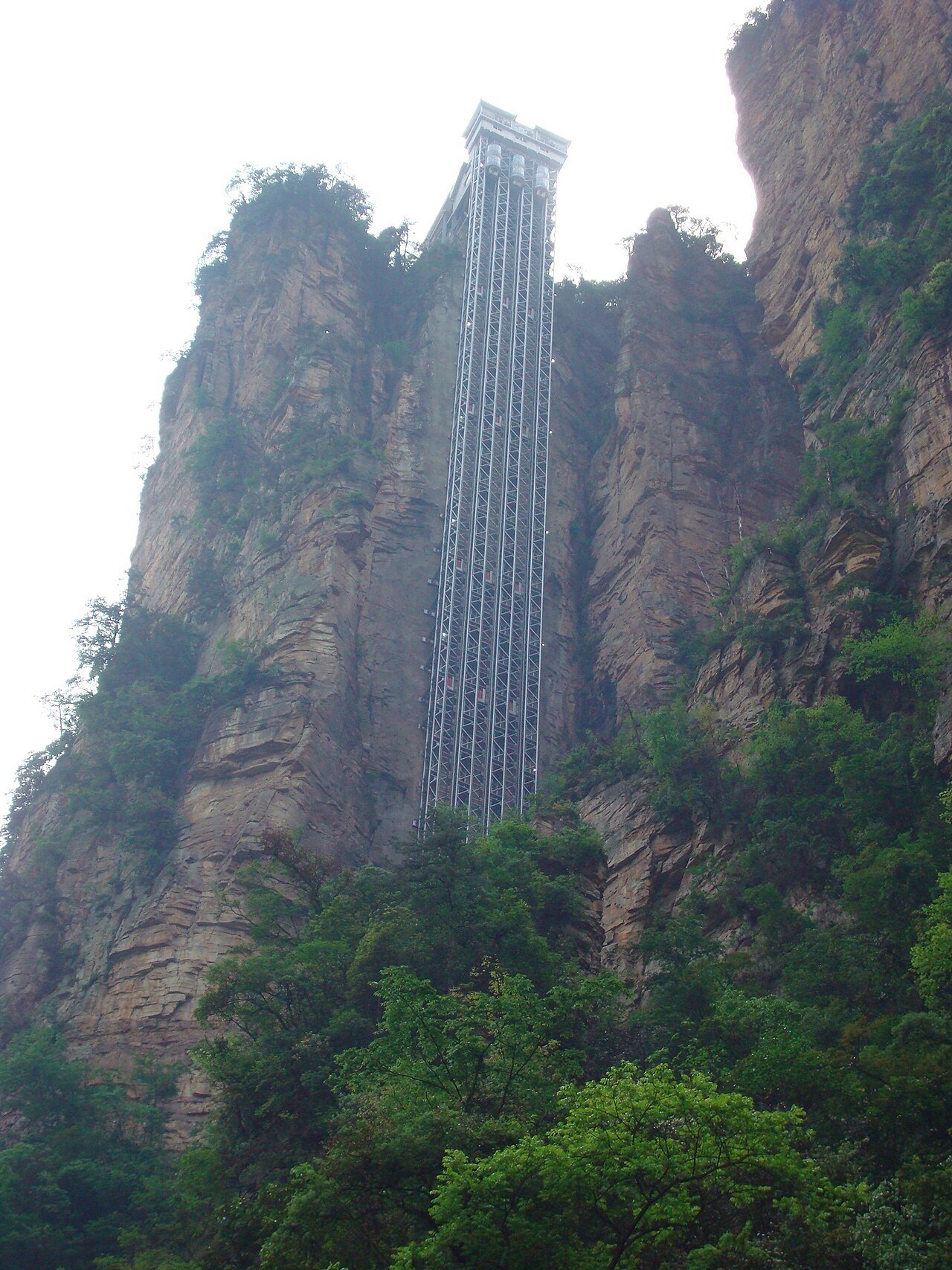 Bailong 326-meter cliff glass elevator ascending vertical sandstone pillars in Wulingyuan