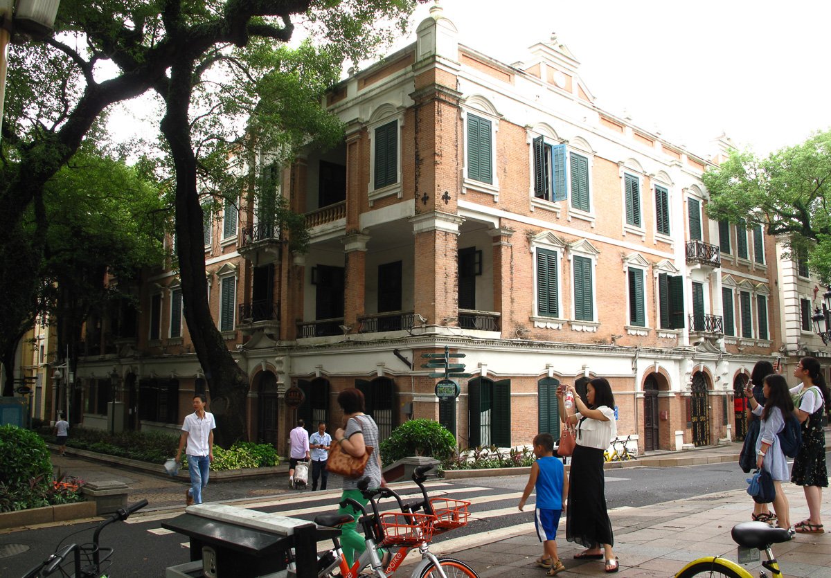 Area photo: Tranquil banyan tree promenade on Shamian Island along the Pearl River in Guangzhou